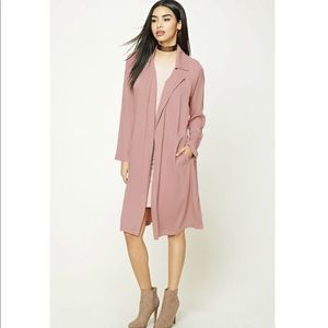 Pink belted trench coat